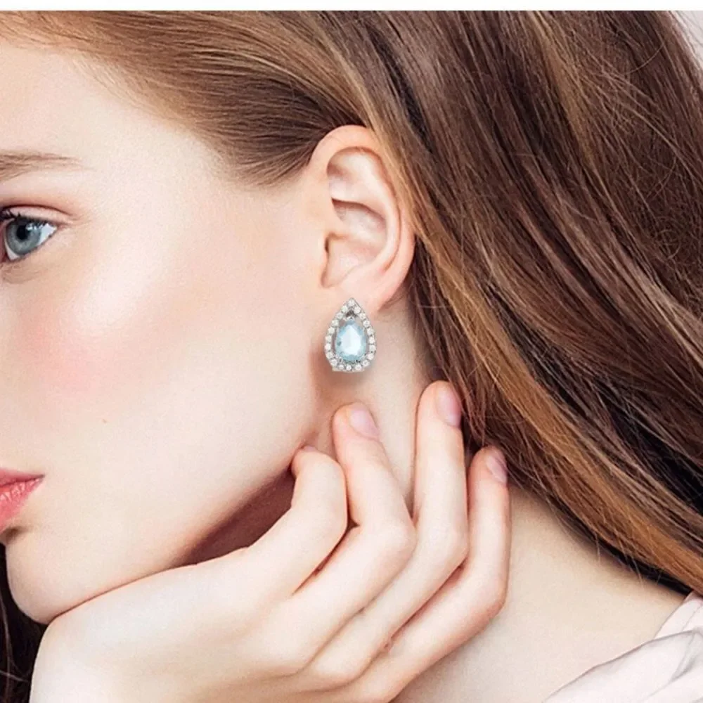 Blue Topaz Tear Drop hinge closure silver earrings
